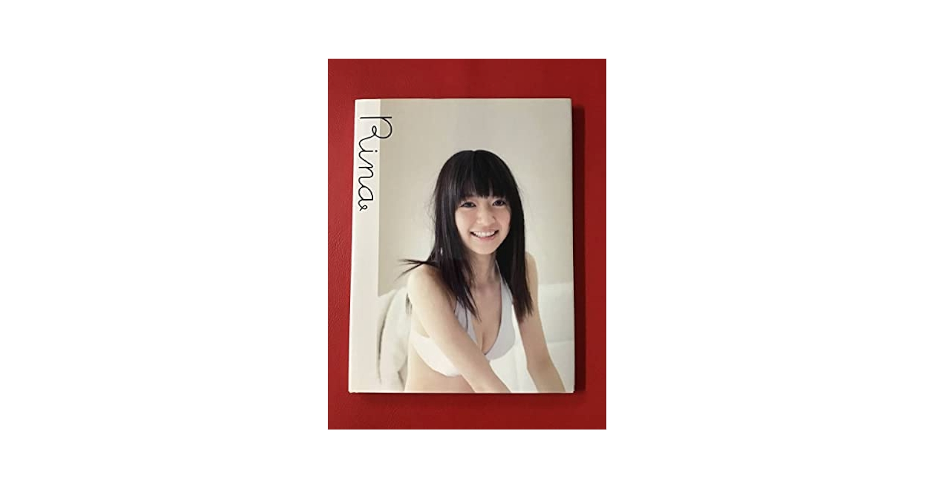 Amazon.co.jp: サイン入り逢沢りな写真集 Rina : おもちゃ